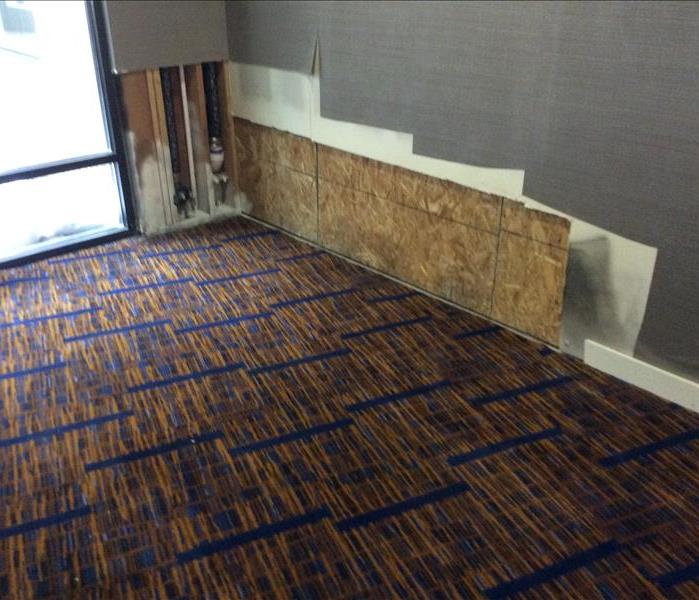 flood cut and carpet in a room